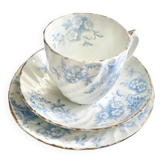 Porcelain cup with saucer and cake plate