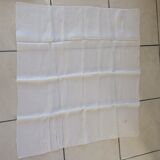4 white towels with red letter