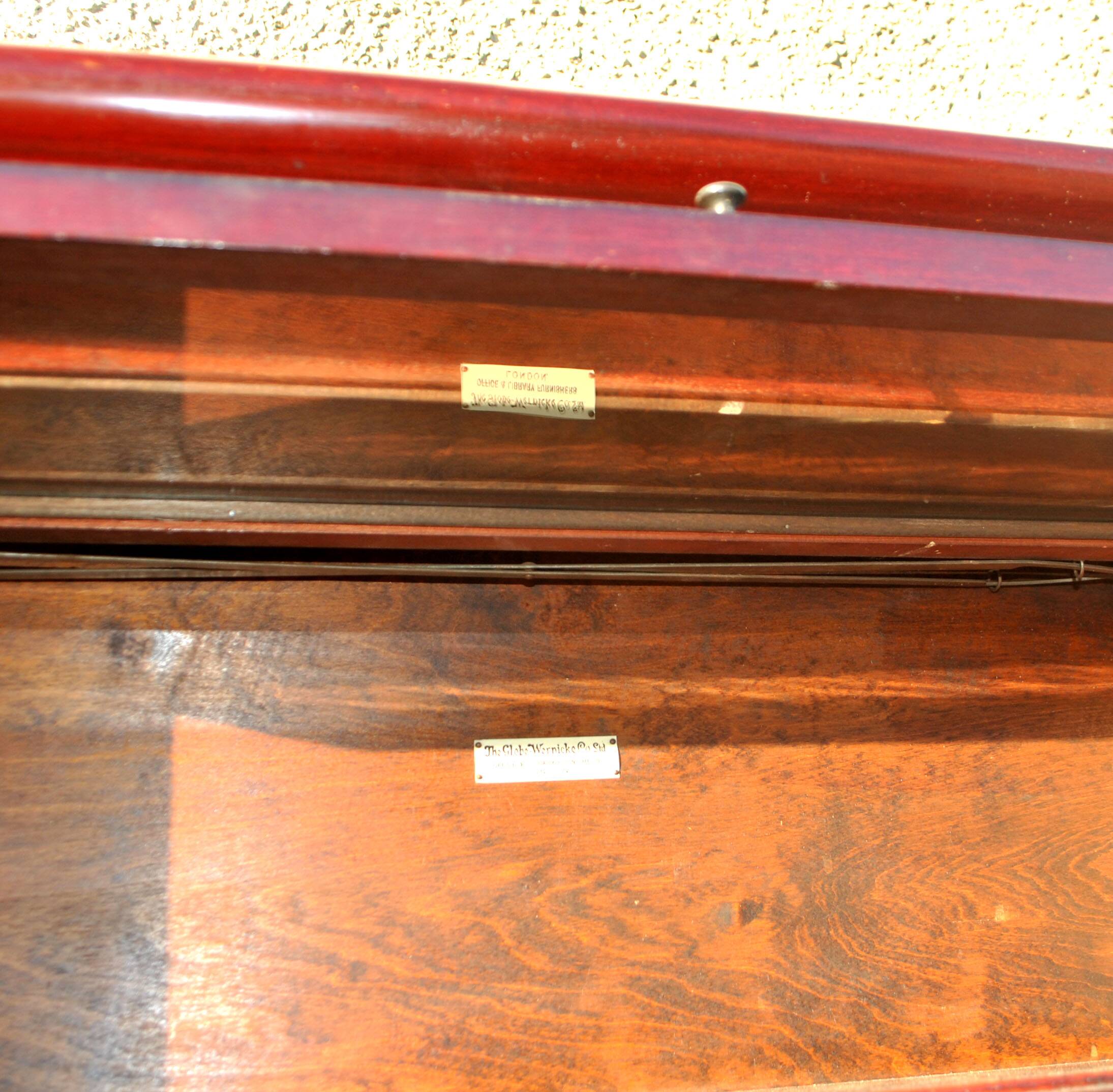Mahogany glass-fronted bookcase THE GLOBE WERNICKE LONDON 1900, a piece of furniture