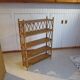 Wooden and rattan bookcase, 1970s-1980s
