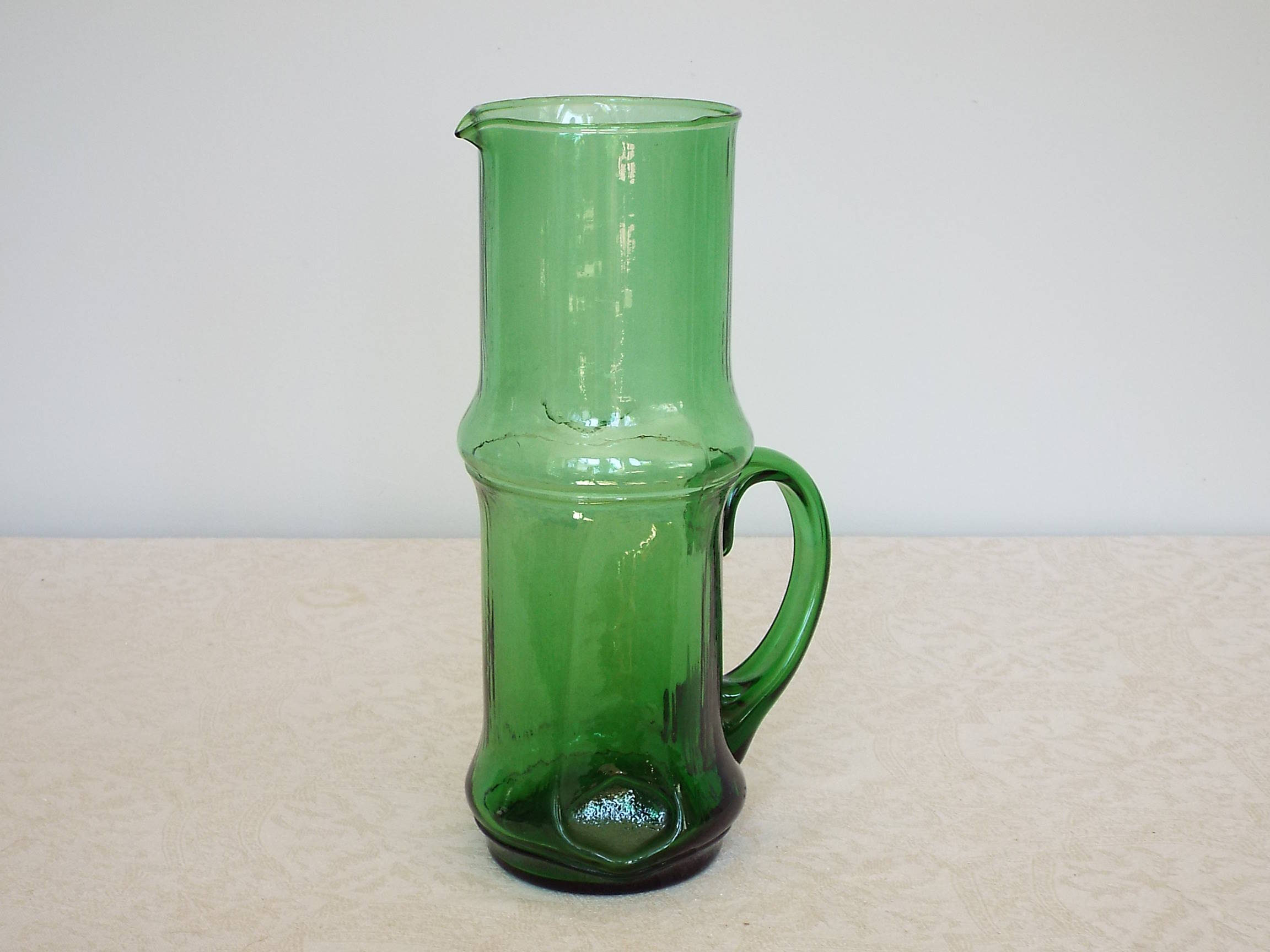 Green glass pitcher