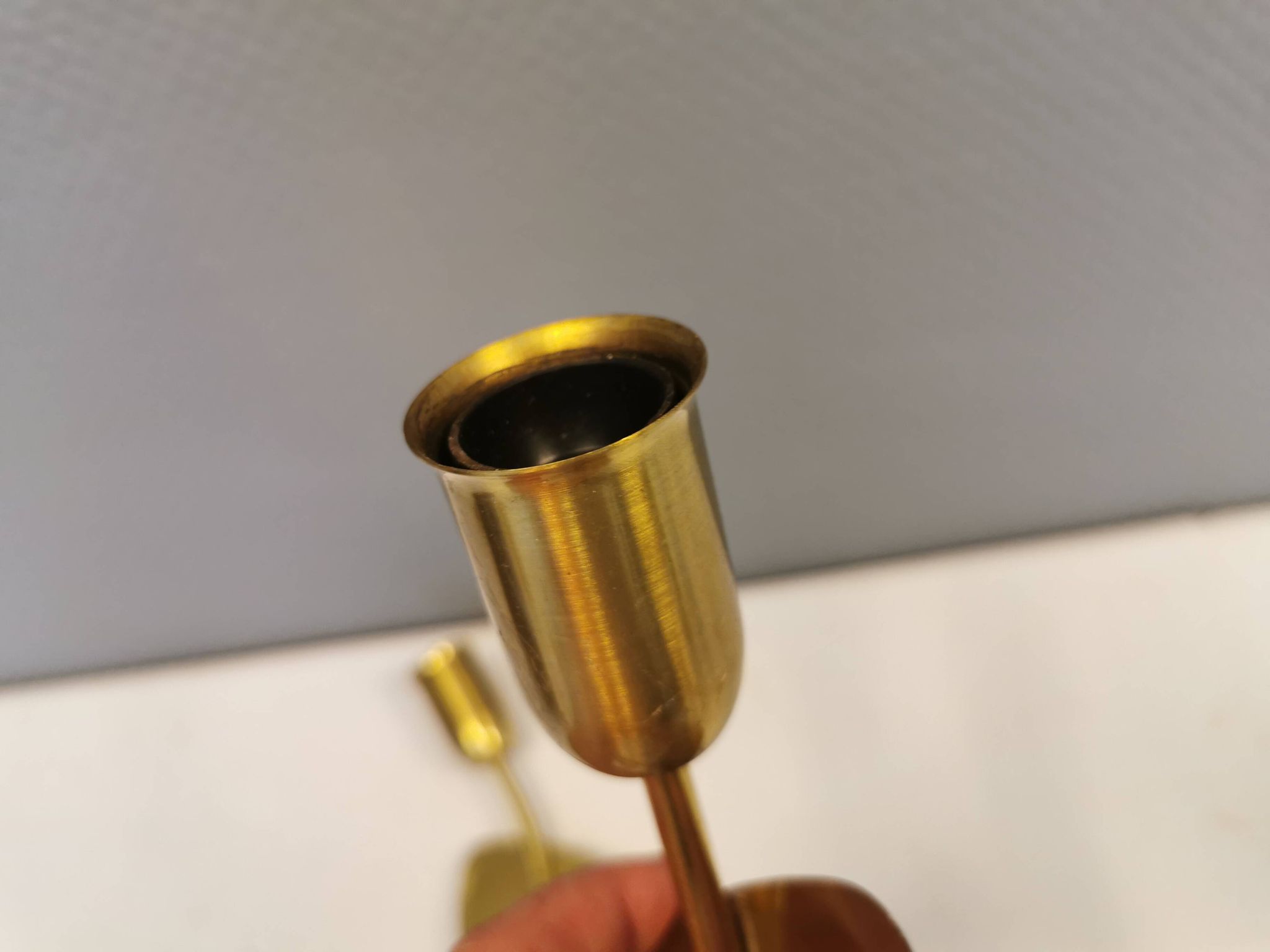 A set of "tulip" wall lamps in golden colored metal. Danish 1970-80s
