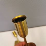 A set of "tulip" wall lamps in golden colored metal. Danish 1970-80s