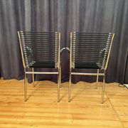 Pair of "Sandows" chairs designed by Rene Herbst, Bauhaus, France, 1980s