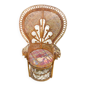 Vintage peacock chair in sculptural blonde rattan, fan back from the 1970s.