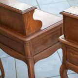Two oak bedside tables.