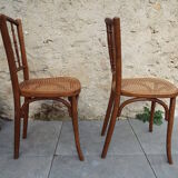 2 bistro chairs seated tanned