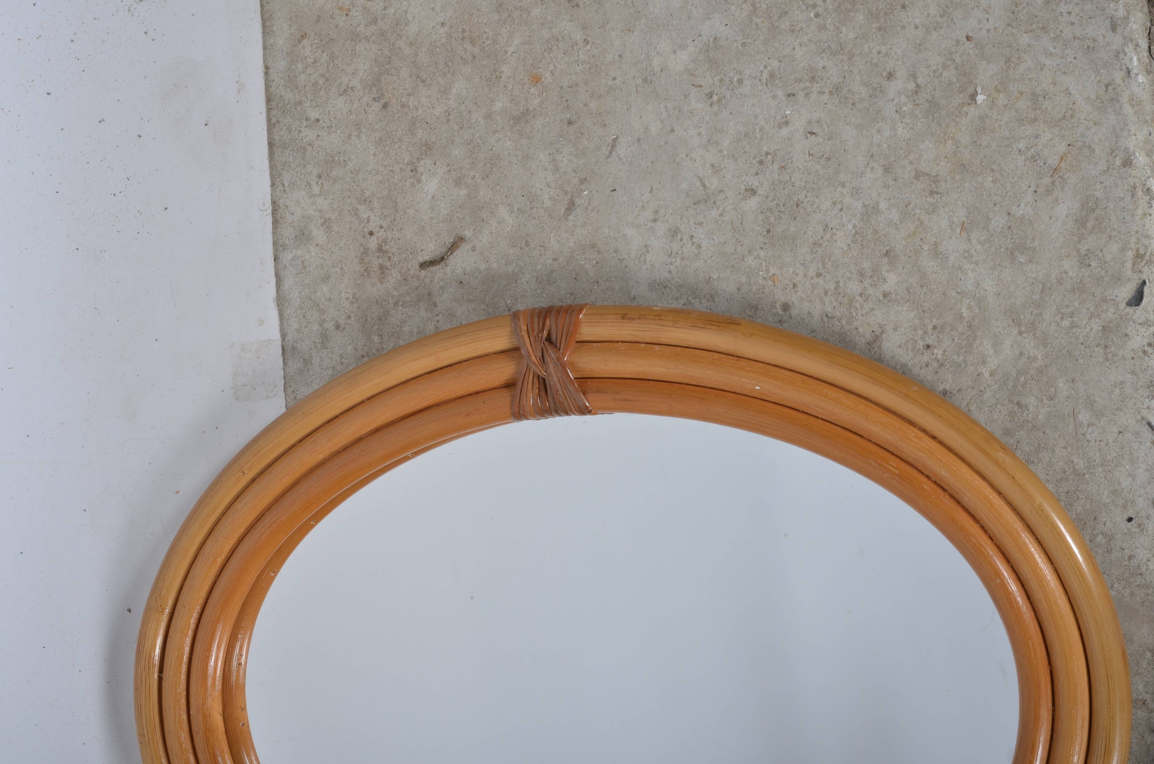 Oval rattan mirror