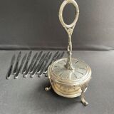 12 "Apollonox" fruit knives on silver metal support