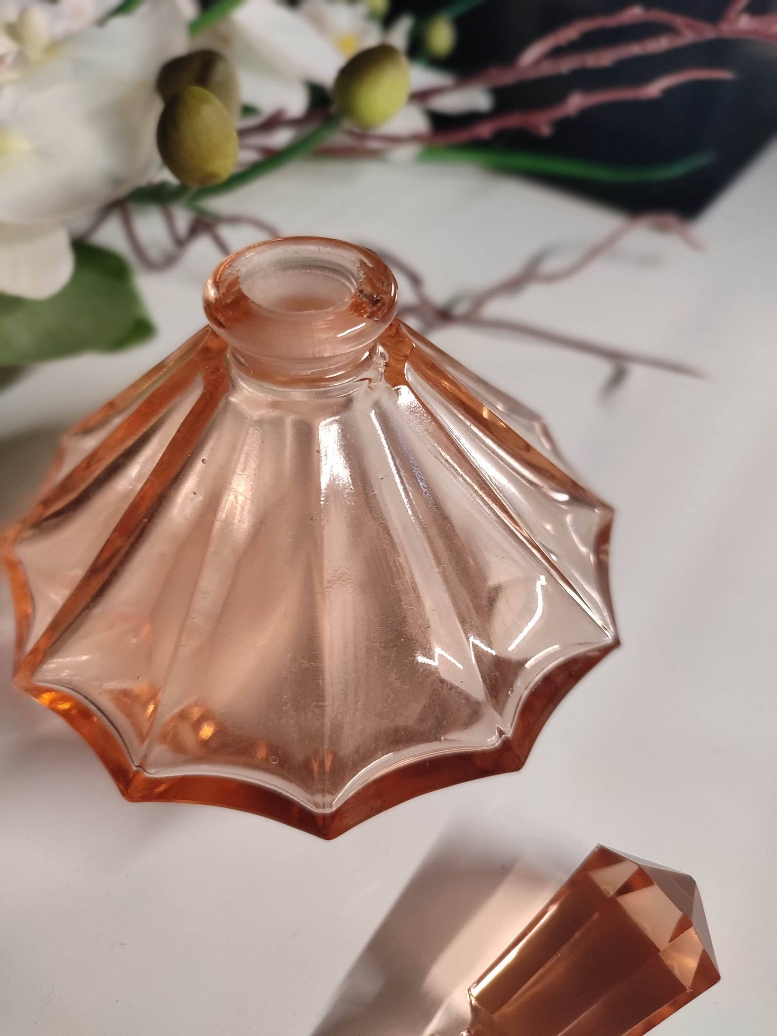 Vintage Art Deco perfume bottle in beautiful pink glass.