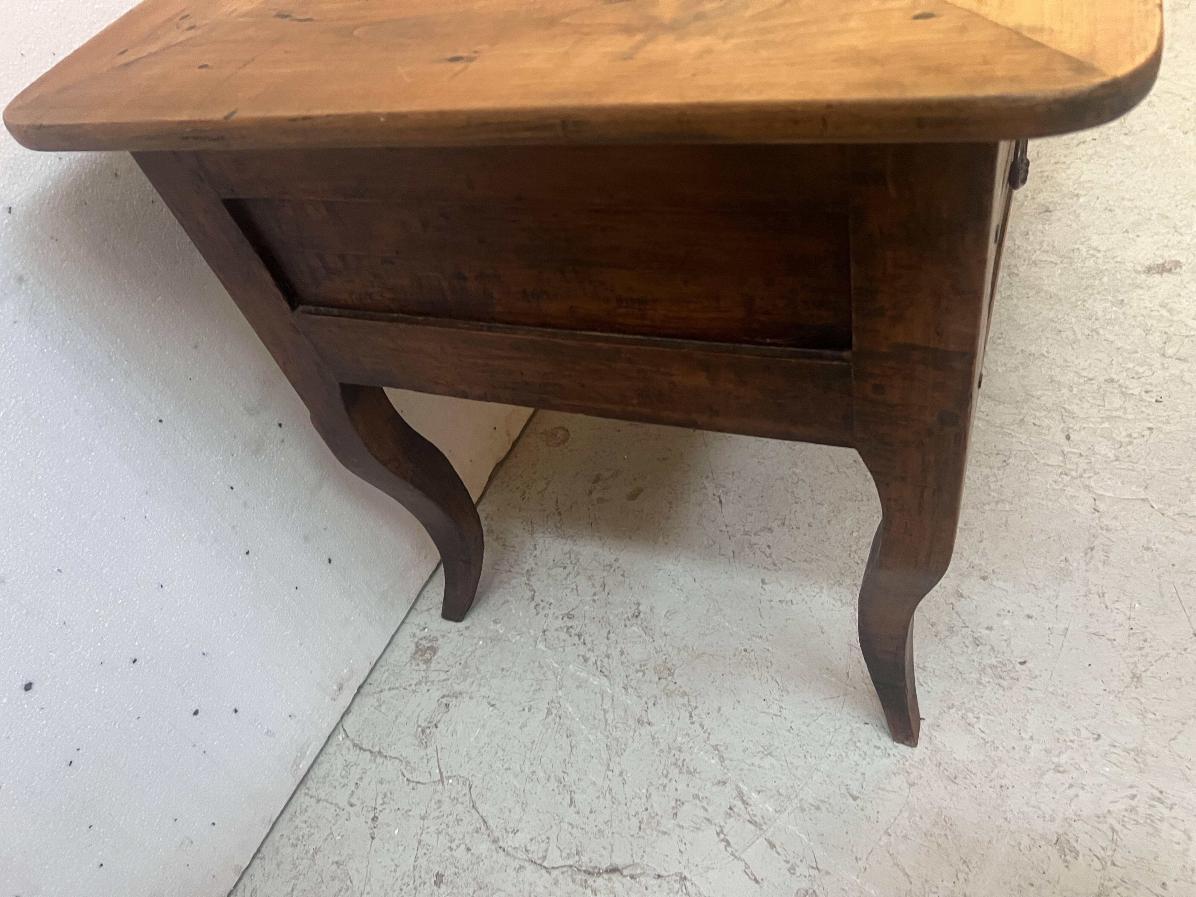 Provincial desk made of solid cherry wood, 20th century.