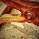 French Empire mahogany office chair with carved detail in the shape of