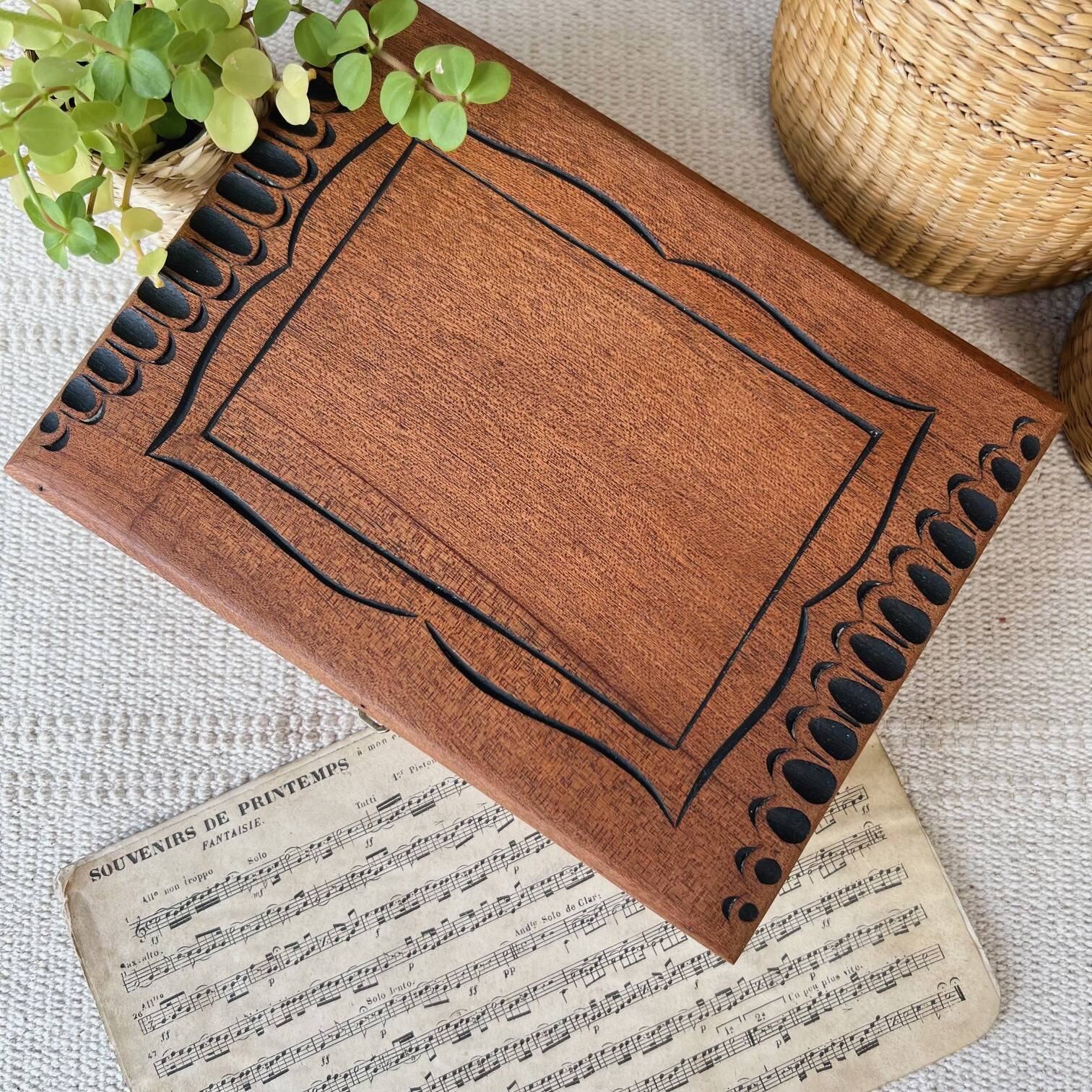 Carved wooden box with key