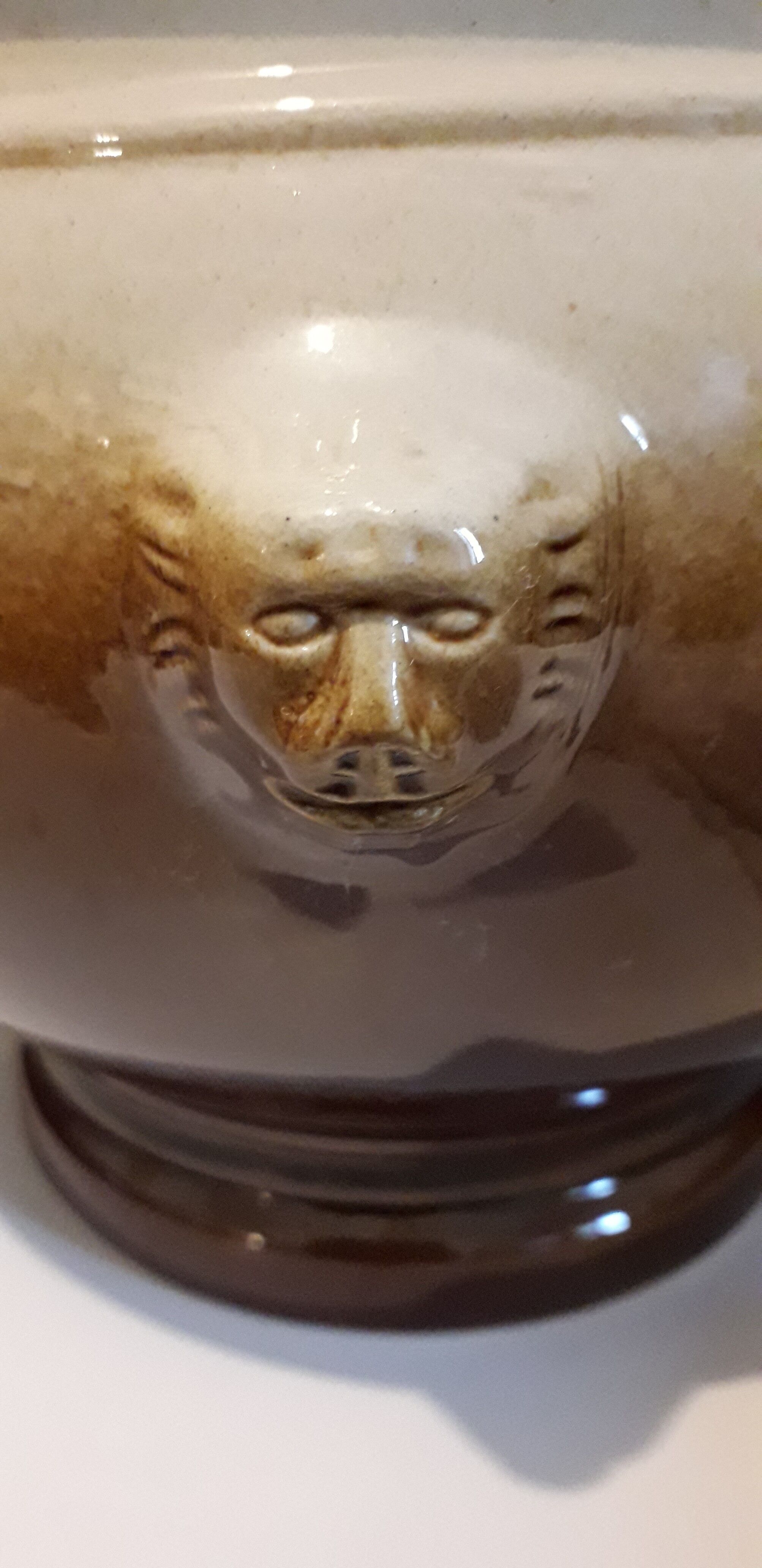 Large covered two-tone ceramic soup bowl with "lion's head" handles