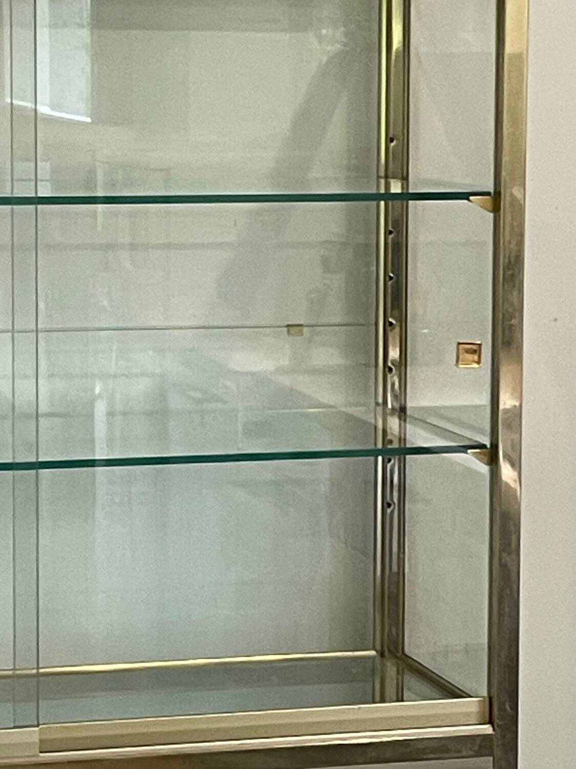 Large exhibition window in gilded brass 20th century period