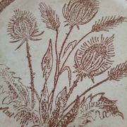 A pair of vintage plates with a rust-brown thistle design – 1950s.
