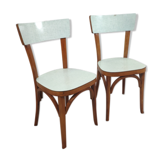 Two blue formica bistro chairs