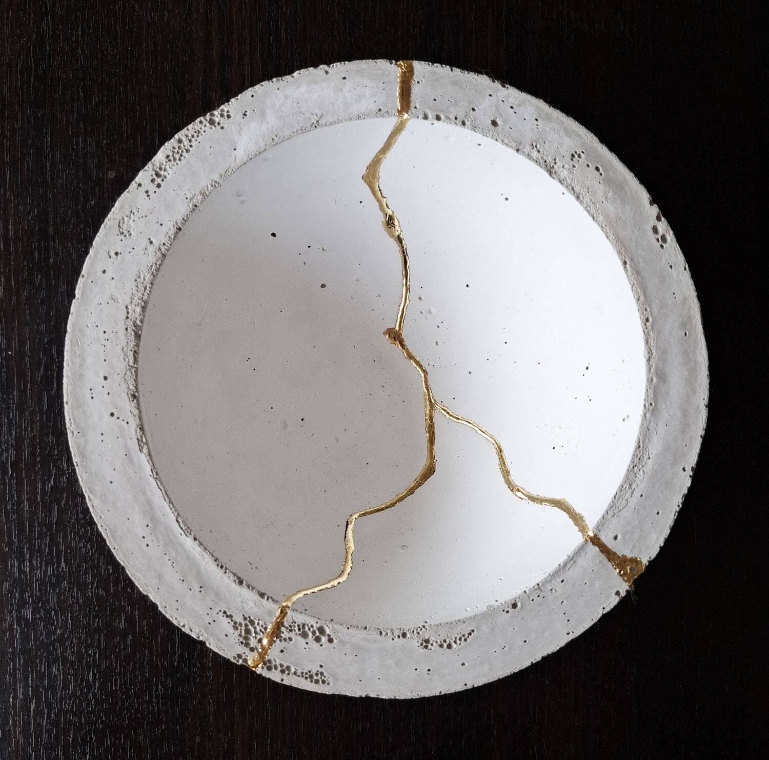 Concrete cup, tinted waxed, inlaid with gold leaf drips in a Kintsugi inspiration