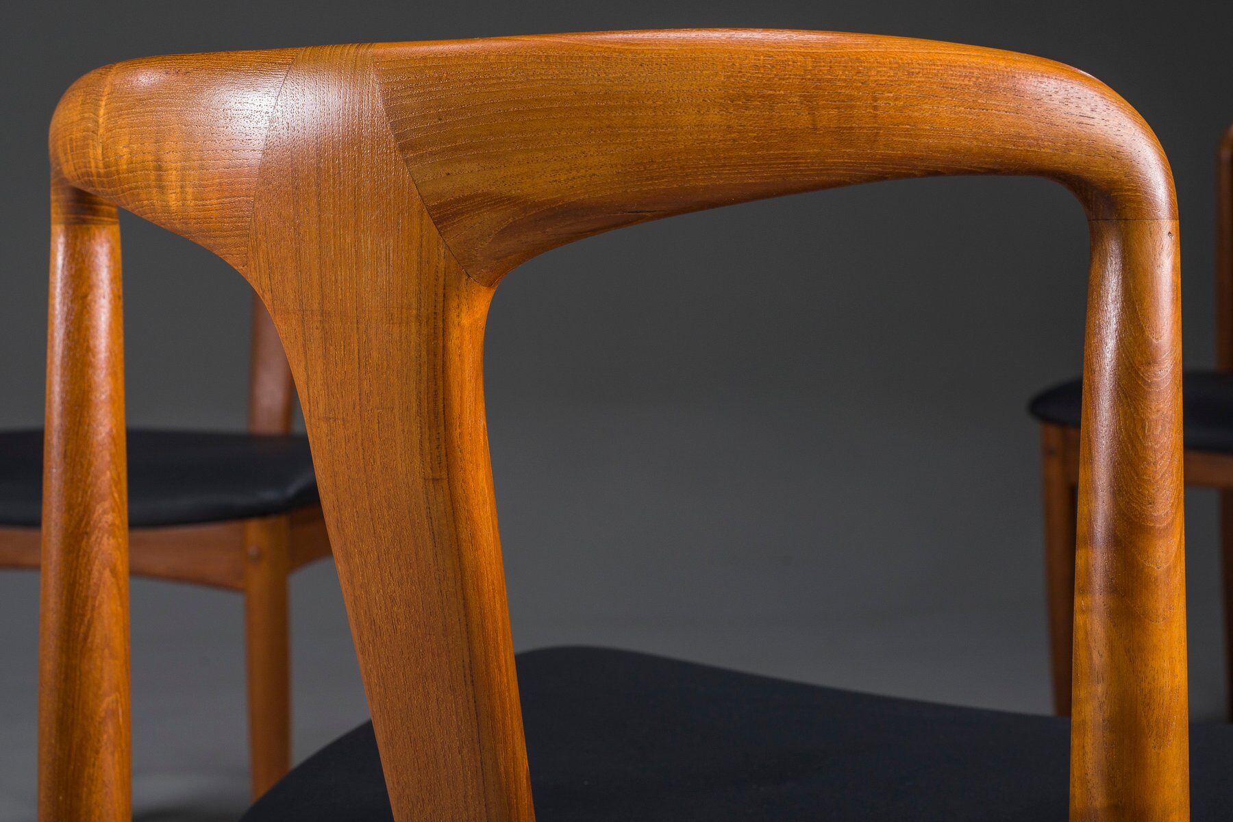 Juliane dining chairs in teak and black leather by Johannes Andersen for Uldum Møbelfabrik, Denmark, 1960s, set of 6