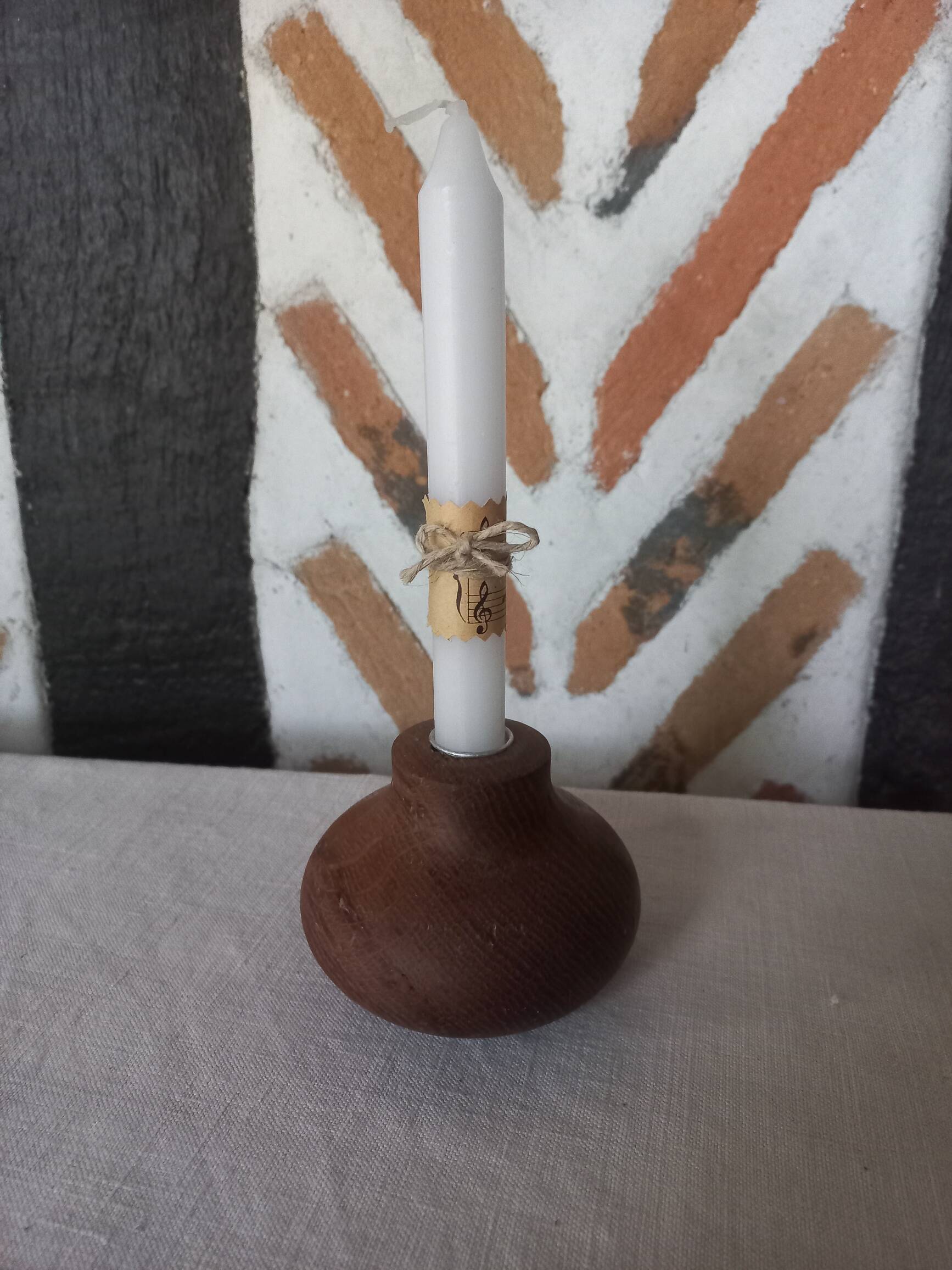 Ball shaped wooden candle holder