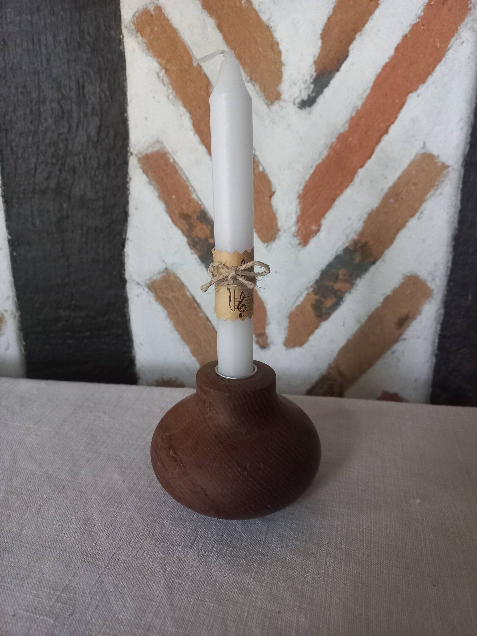 Ball shaped wooden candle holder