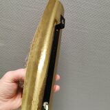 Older wall lamp in brass with hard pressed glass shade.