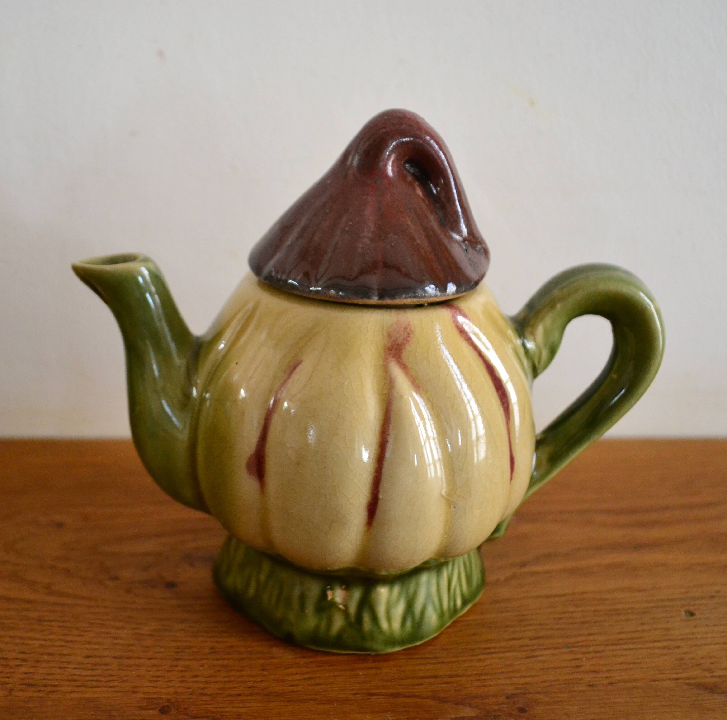 Small vintage earthenware teapot