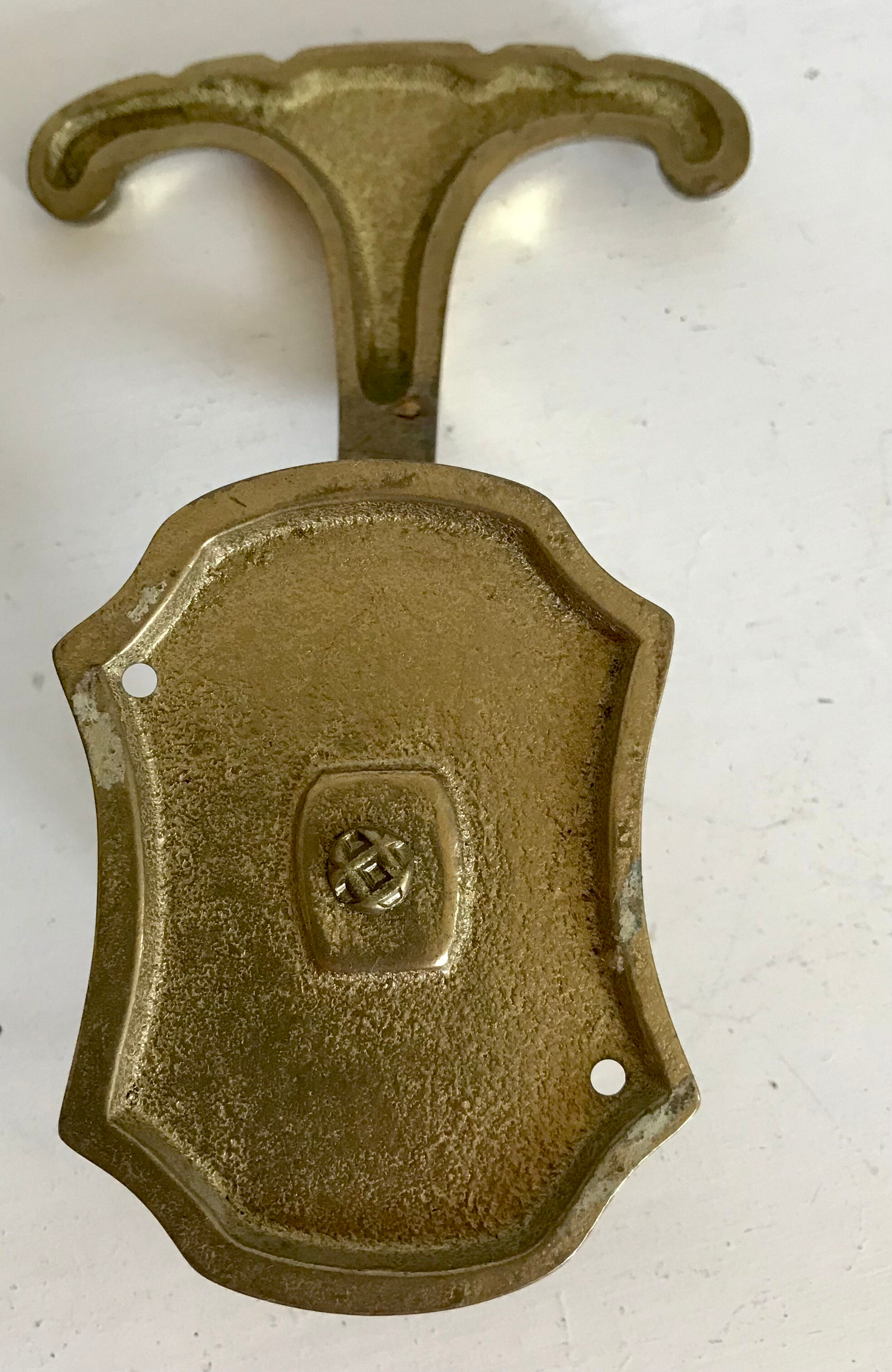 Pair of brass patères