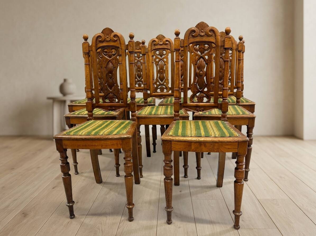 Set of 9 Renaissance Revival dining chairs, carved wood, Czechoslovakia, early 20th century