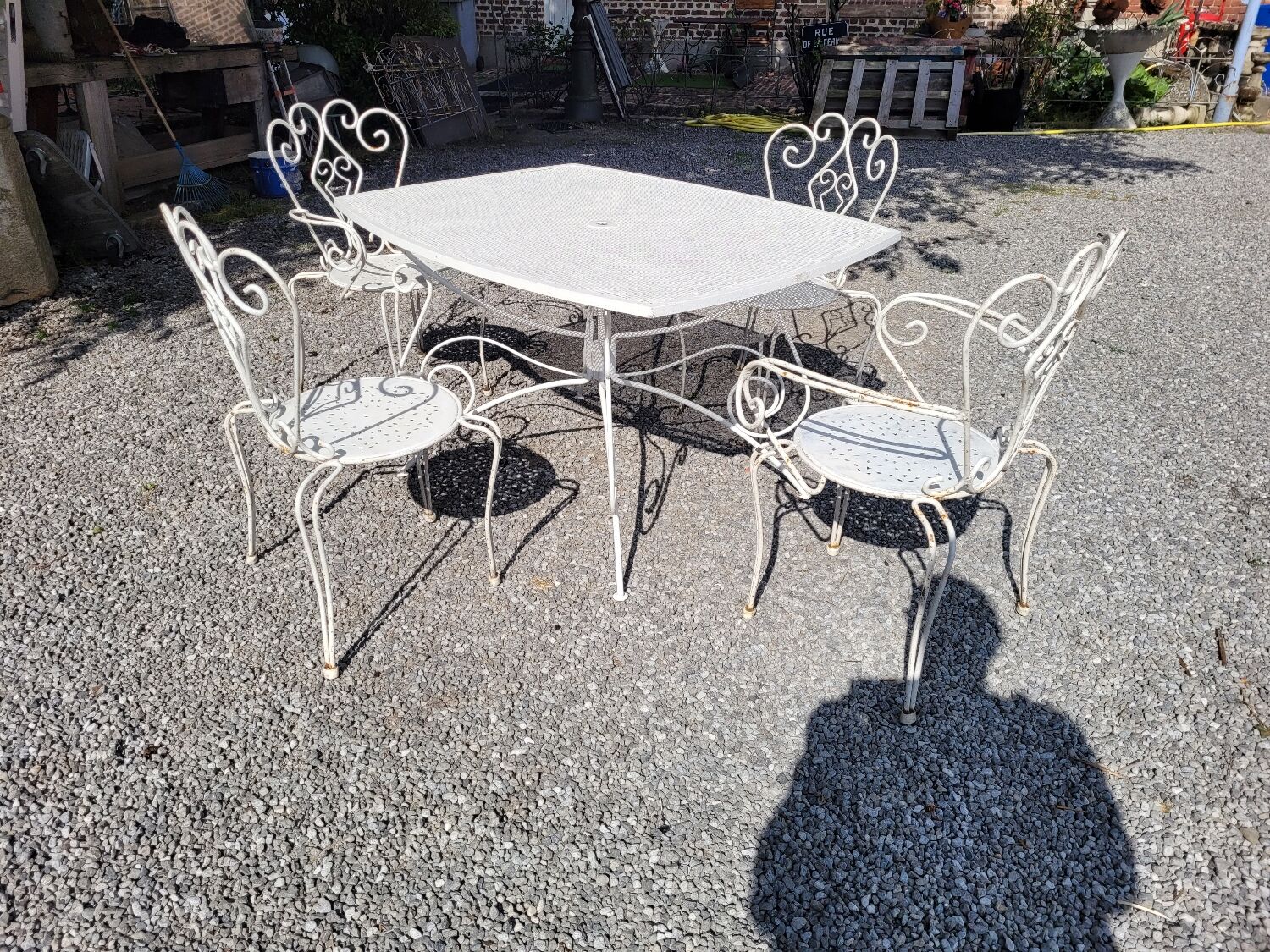 Old wrought iron garden furniture, table + 2 armchairs + 2 chairs