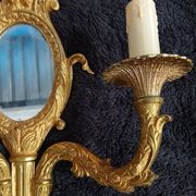 Pair of wall sconces with mirrors. Putti. Bronze. Floral Art Nouveau.
