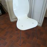 White plexiglass chair
