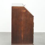 Antique English oak secretary from the 18th century with a stepped interior