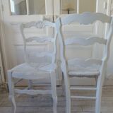 Duo of country-style chairs re-enchanted in pearl gray.