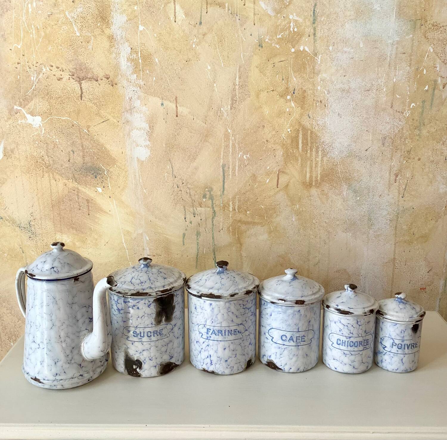 Spice jars and coffee maker in enameled sheet metal