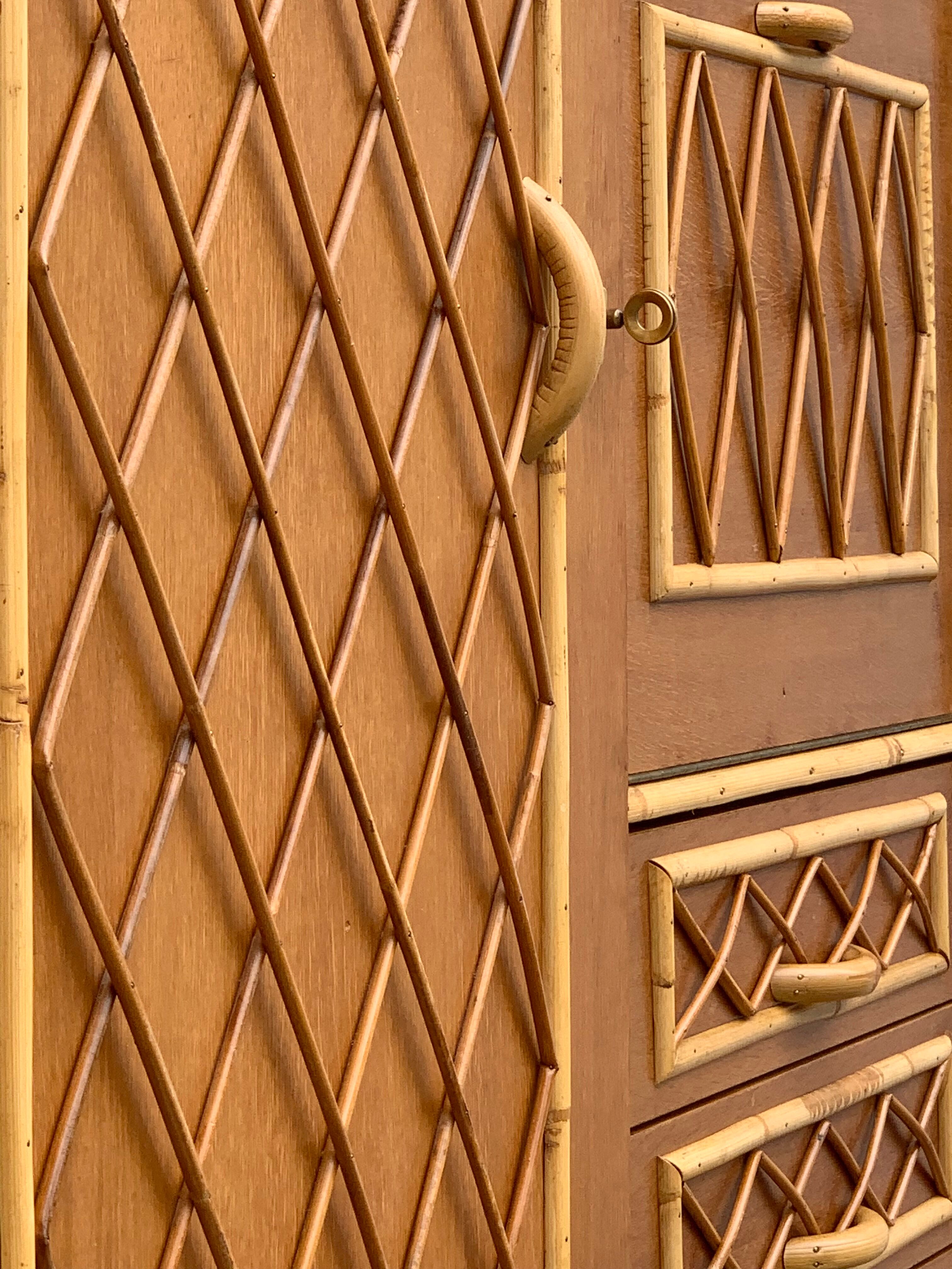 Rattan wardrobe with tapered legs from the 1960s.