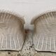 Pair of white rattan armchairs