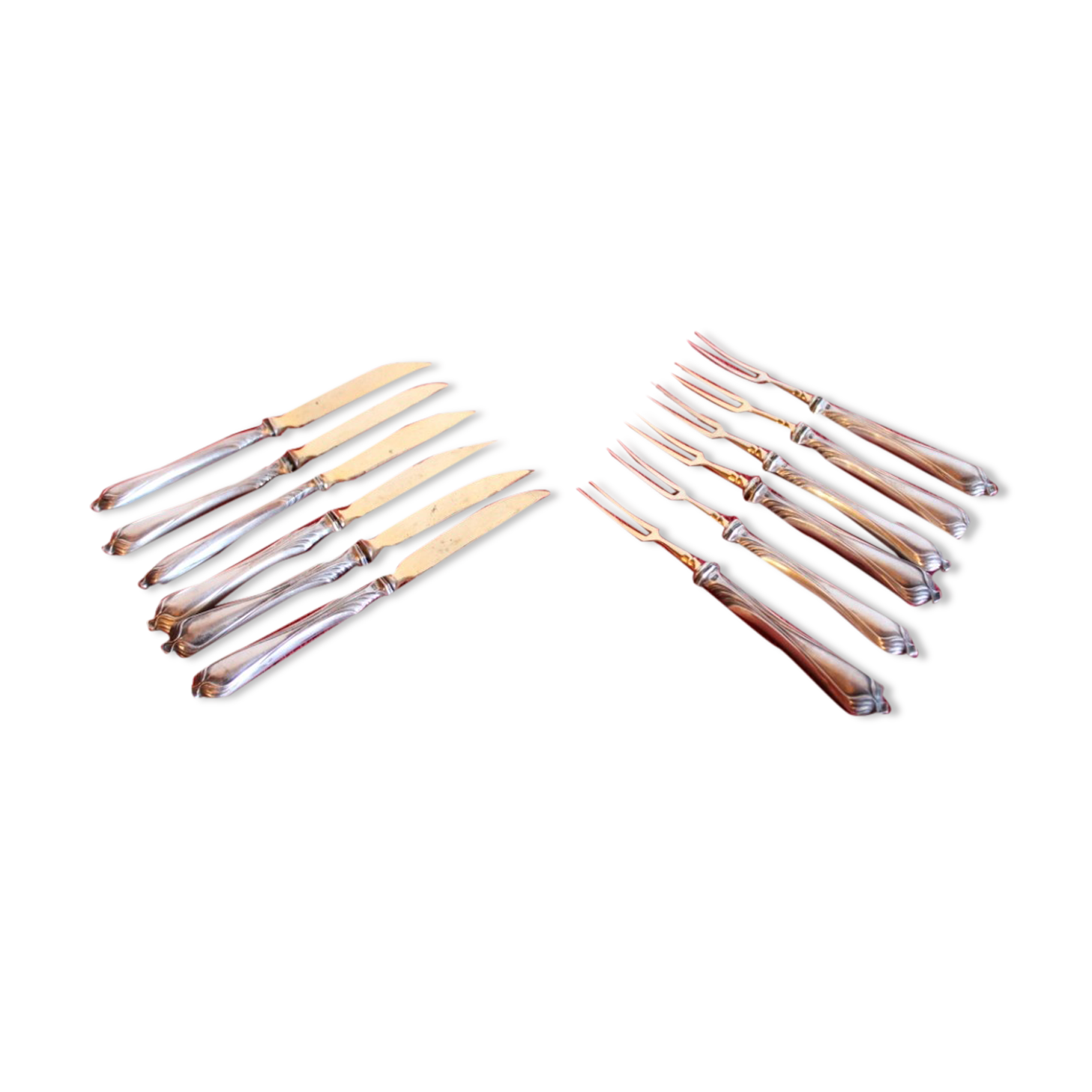 Set of knives and forks for fruits.