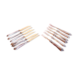 Set of knives and forks for fruits.