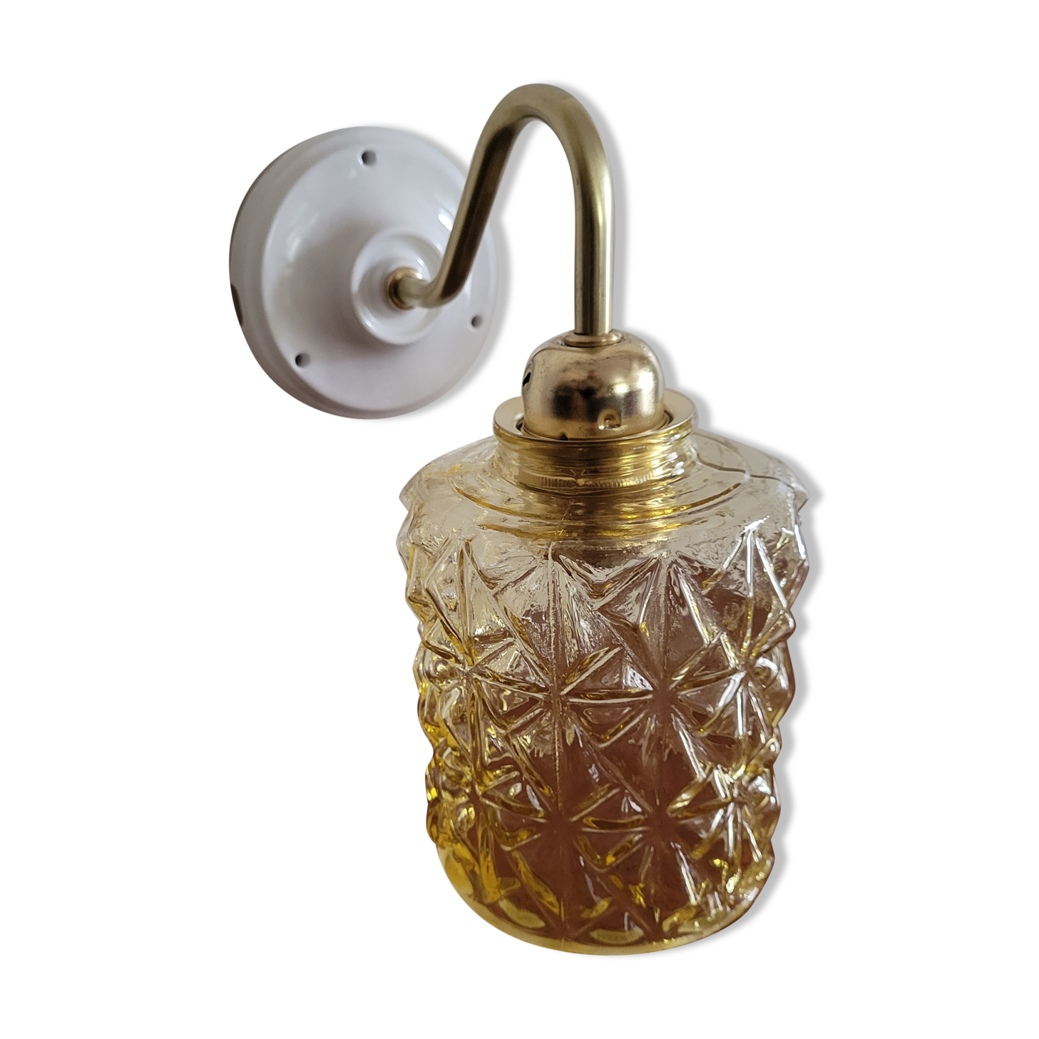 Brass wall lamp and molded glass