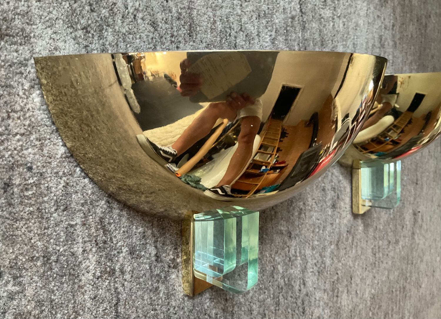 Pair of Hollywood Regency half-moon wall lamps in gilded metal and plexiglass