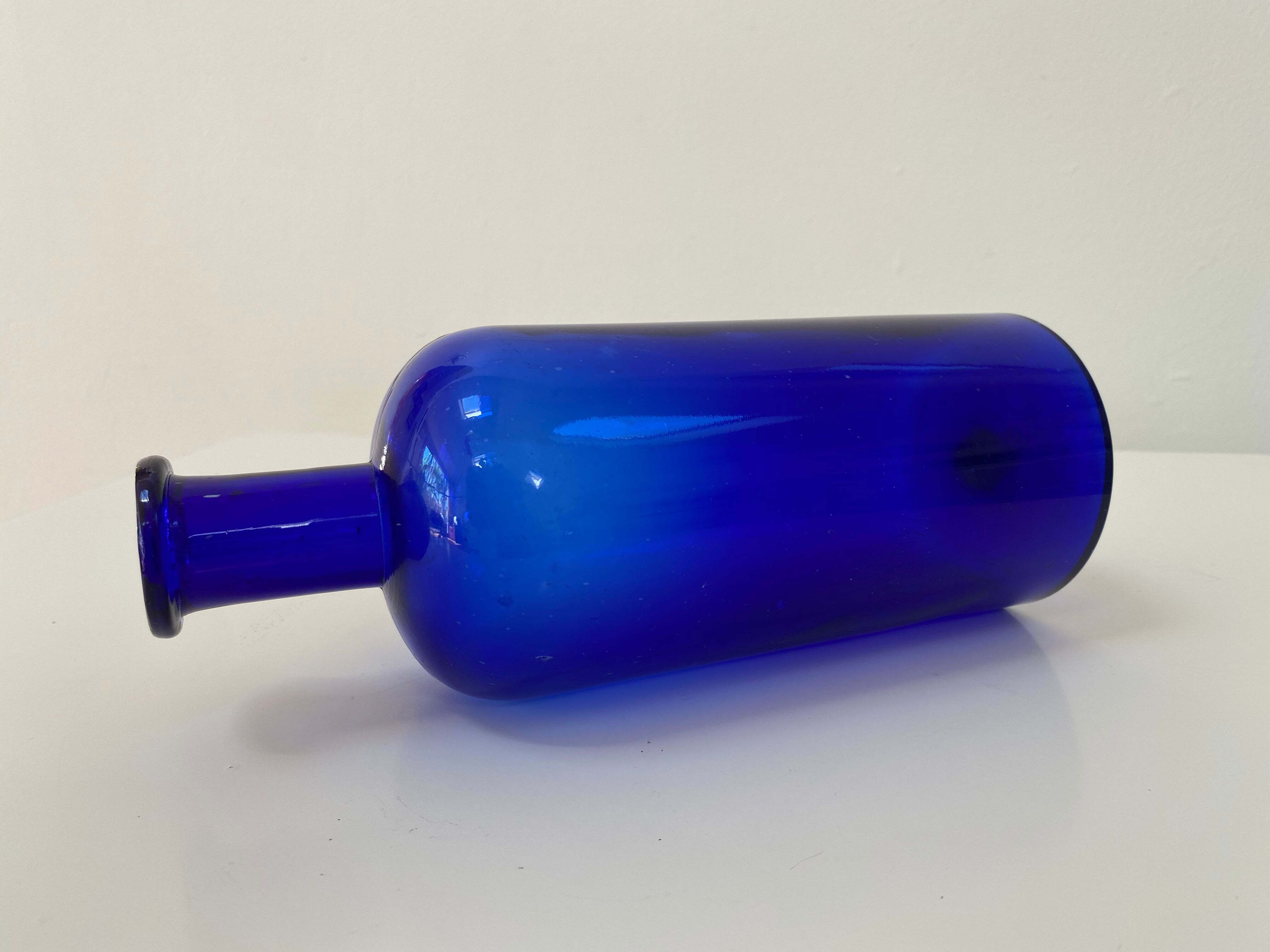 Cobalt blue glass pharmacy bottle