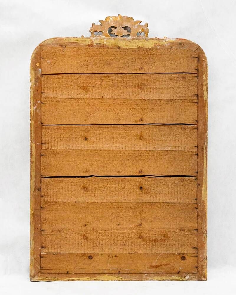 Louis-Philippe mirror from the 19th century with a ribbon trompe-l'œil frame.