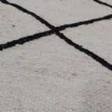 Traditional Berber beige and black carpet - 142x70cm