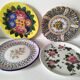 Set of four floral plates Longwy Toledo Talavera Sarreguemines LB