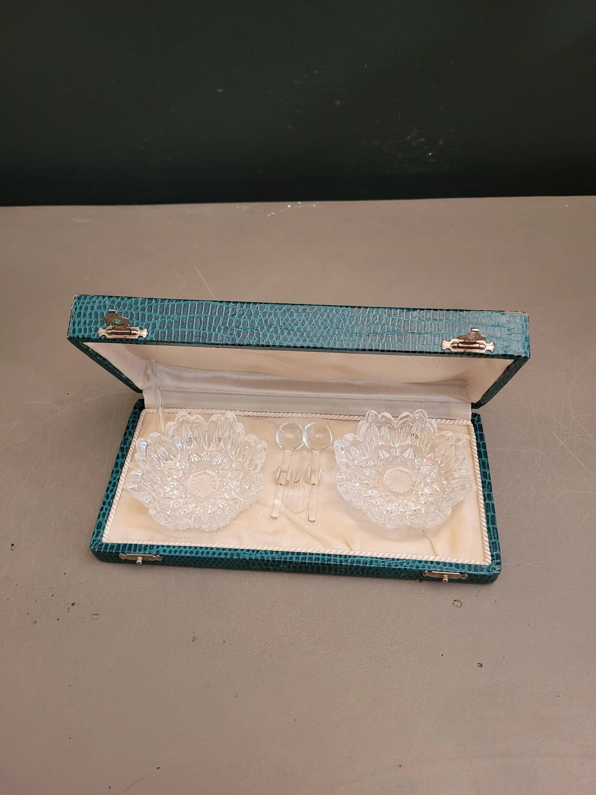 Pair of crystal salt cellars with spoons