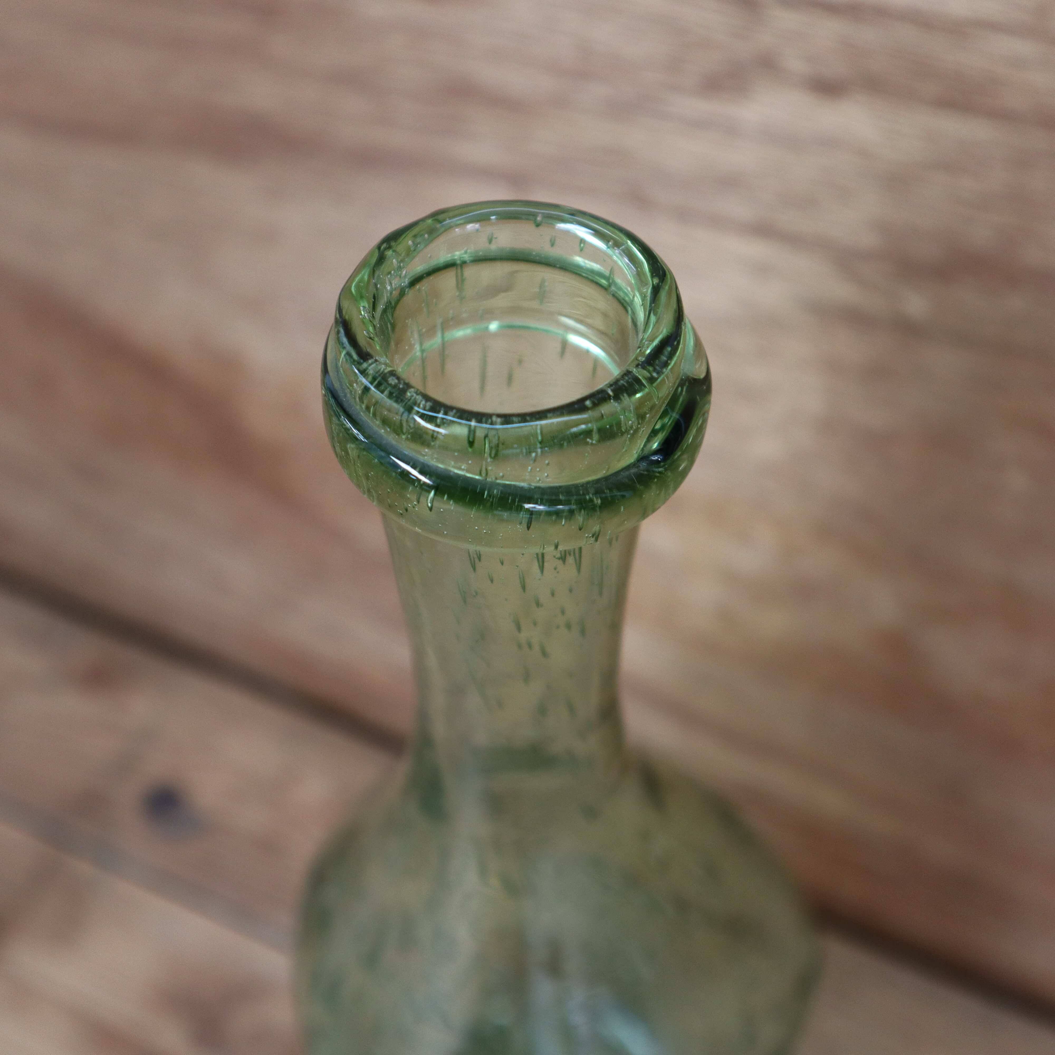Biot water green colored bubble blown glass bottle