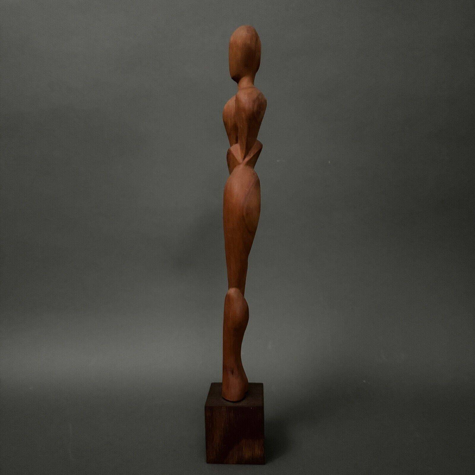 Carved wooden sculpture of a woman by Calin Hentea, 20th century