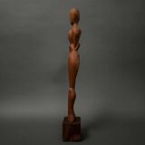 Carved wooden sculpture of a woman by Calin Hentea, 20th century