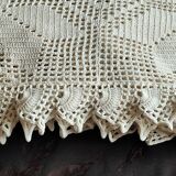 White cotton bedspread, crocheted sofa throw with star patterns